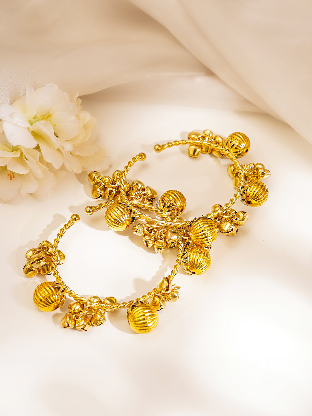 Gold Twisted Ghungroo Statement Bangles