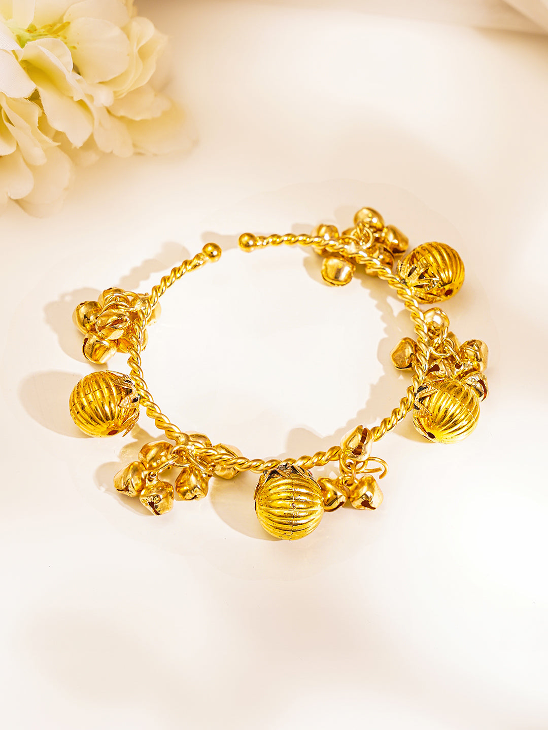 Gold Twisted Ghungroo Statement Bangles