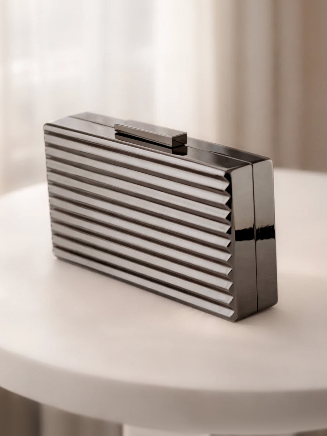Midnight Gloss Ribbed Statement Clutch Bag